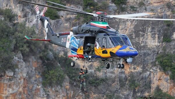 Paramedic hoisted out of helicopter 