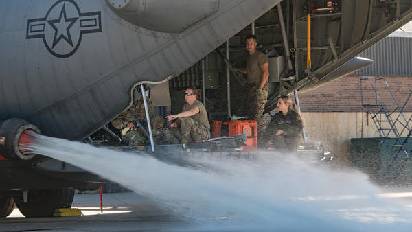 Plane spraying out water