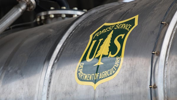 Forest service logo on barrel