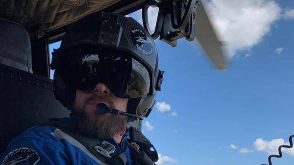 Pilot wearing helmet