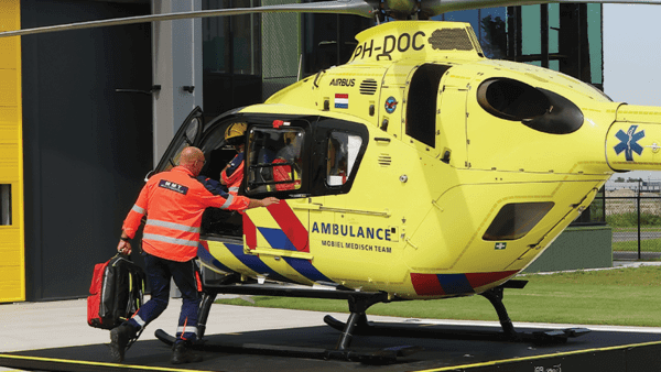 Man getting in helicopter