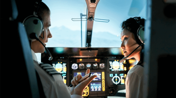 Pilots talking to each other in cockpit