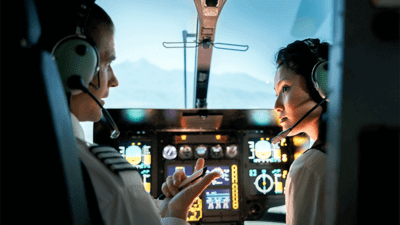 Pilots talking to each other in cockpit