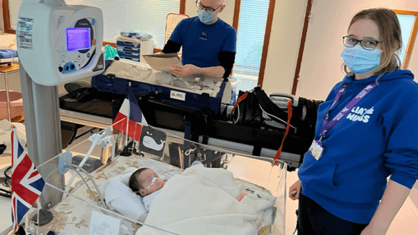 Baby being treated in hospital bed