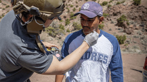 Med crew helping patient