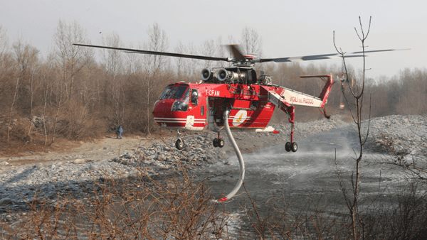 collecting water from pipe in helicopter 