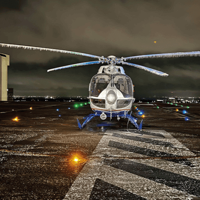 Parked helicopter at night 