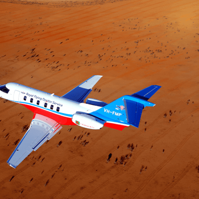 Plane flying over desert