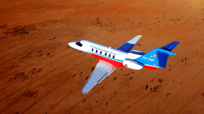 Plane flying over desert