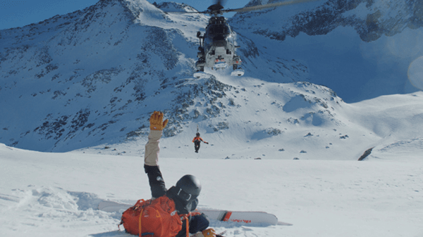 Helicopter saving person caught in the snow