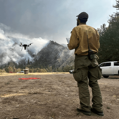 Man flying drone. Credit: USDA Forest Service